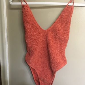 Sexy one pc bathing suit, low cut